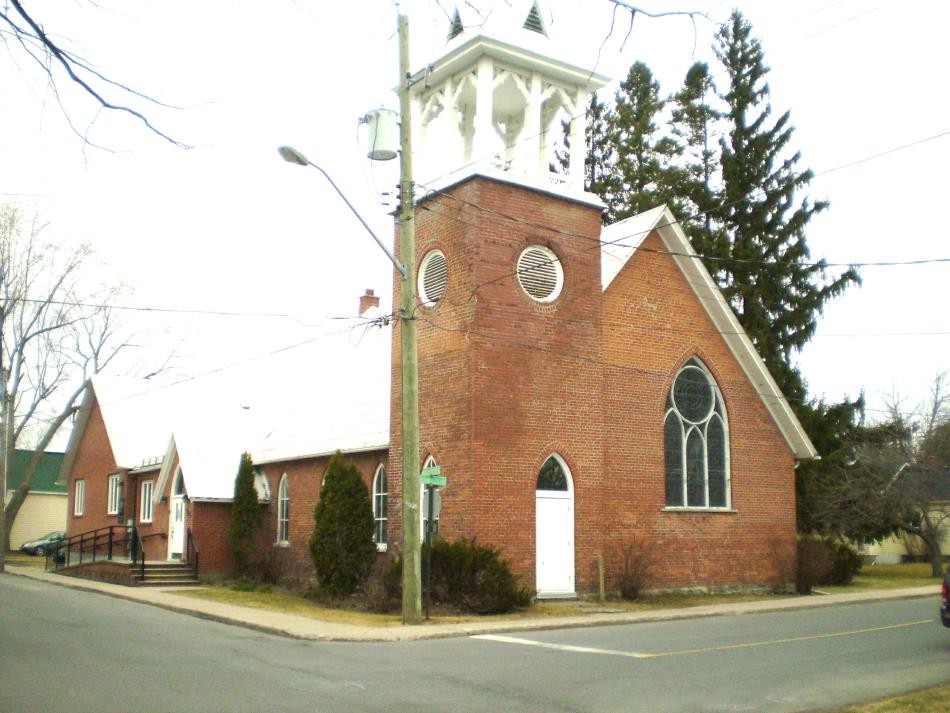 St. Mary’s Anglican Church, showing its brick walls and tower.